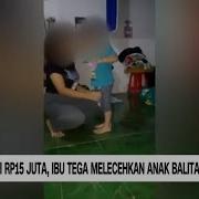 Ibu Dan Anak Berbaju Biru