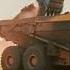A Dramatic Shot Of The Deep Hole Being Formed With Shadows Cast Inside It Excavator Automobile