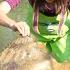 Country Girl S Lucky Moment Peculiar Clam Yields Pearl Adding Joy To Quiet Rural Existence