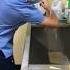 Why Do Surgeons Raise Their Hands After Washing