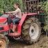 Girl Agricultural Machine Driver Driving Wood Loader Back To Assembly Point