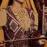 A Uygur Girl From Xinjiang Is Performing Ethnic Charm Gijak A Traditional Instrument Of Xinjiang