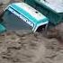 Mobil Truk Terbawa Banjir Bandang