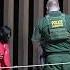 Migrants Detained By US Border Patrol Agents After Crossing US Mexico Border