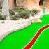 Playing The Paradise Falls Course At Lighthouse Cove Mini Golf