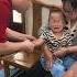 E2472 The Mother Saw The Baby Holding The Candy And Asked In Surprise Already Better