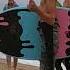 Surfers Throw A Shaka To The Captain