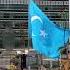 East Turkestan Flag And National Anthem In Front Of UN Headquarters New York City