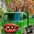 Evolution Of A Rusty Truck Carrying Large Penguins Into A Hino Truck Carrying Lollipops