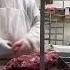 Worker Cuts Finger Cutting Meat