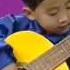 North Korea Kindergarten Children Playing Guitar At Chongam Kindergarten Chongjin
