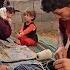 A Newborn In Arms Children In Dust A Sleepless Mother Life In A Half Built Fisherman S Home