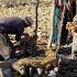 Iranian Nomadic Life Building A Traditional Toilet In The Mountains With Natural Stone And Soil