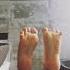 Sweaty Male Feet On Table